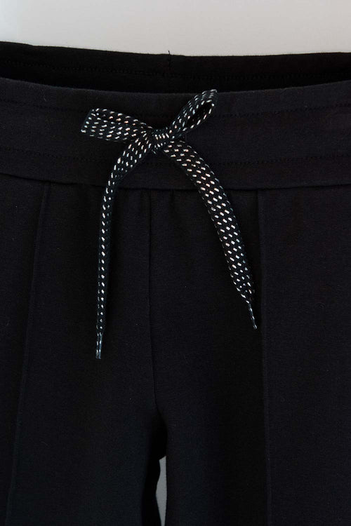 Card slide image -  JOGGER DE MIC CON CORDÓN NEGRO PARA NIÑA