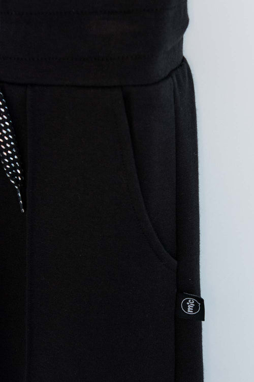 Card slide image -  JOGGER DE MIC CON CORDÓN NEGRO PARA NIÑA