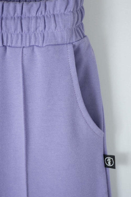 Card slide image -  JOGGER DE MIC BOTA ANCHA MORADO PARA NIÑA