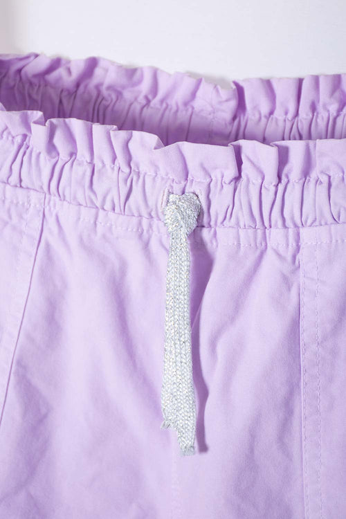 Card slide image -  SHORT DE MIC CON CORDÓN MORADO PARA NIÑA