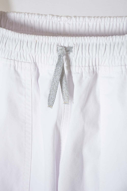 Card slide image -  JOGGER DE MIC CON CORDÓN BLANCO PARA NIÑA