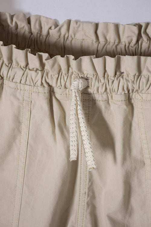 Card slide image -  SHORT DE MIC CON CORDÓN CAQUI PARA NIÑA