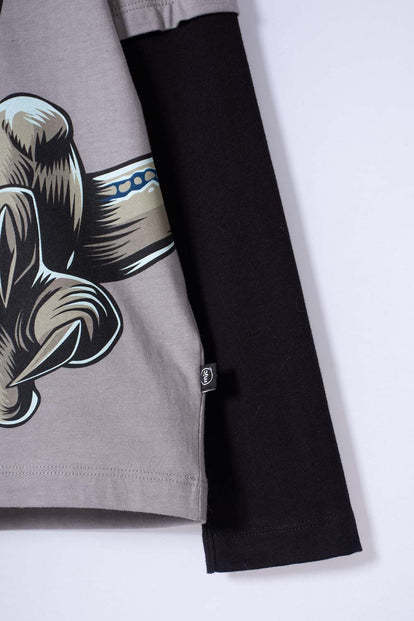 CAMISETA DE JURASSIC WORLD GRIS Y NEGRA DOBLE MANGA PARA NIÑO