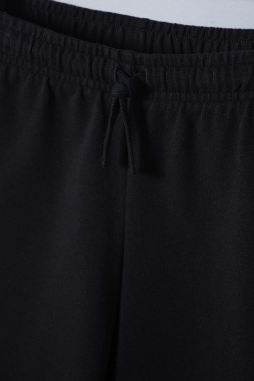 CONJUNTO DE TOY STORY CON BERMUDA MARFIL Y NEGRO PARA NIÑO