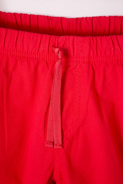 Card slide image -  BERMUDA DE MIC CON BOLSILLOS ROJA PARA NIÑO