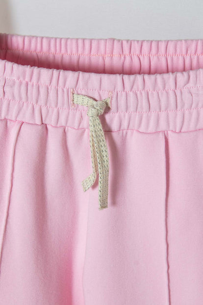  JOGGER DE MIC CON CORDÓN ROSADO PARA NIÑA