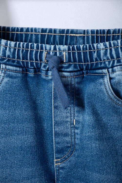 Card slide image -  JOGGER DE MIC CON CORDÓN AZUL PARA NIÑO