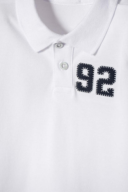 CAMISETA TIPO POLO DE LITTLEMIC BLANCO PARA NIÑO 2T A 5T