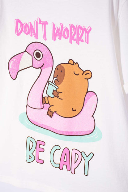 CAMISETA DE CAPYBARA MARFIL ESTAMPADA EN FRENTE PARA NIÑA