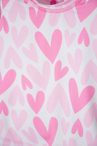 VESTIDO DE BAÑO DE LITTLEMIC CON GORRO ROSADO PARA BEBÉ NIÑA