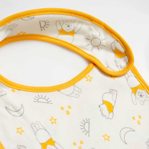 FOTOS DÚO BABEROS DE WINNIE THE POOH CON BROCHE AJUSTABLE AMARILLO PARA BEBÉ NIÑA
